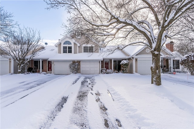 front facade with a garage