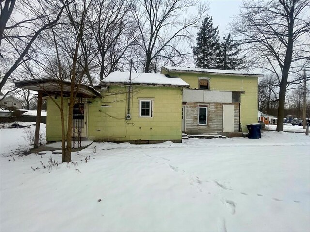 view of snow covered property