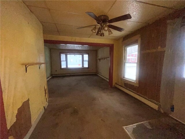 interior space featuring ceiling fan