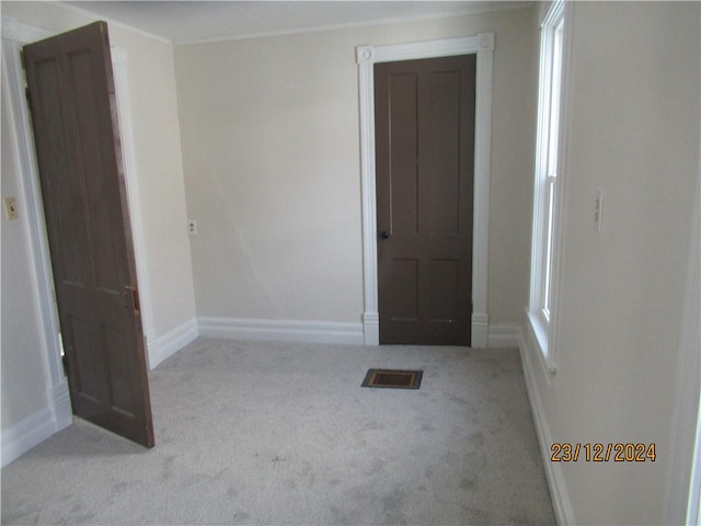 view of carpeted spare room