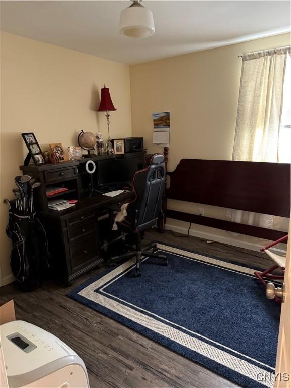 office space featuring dark hardwood / wood-style flooring