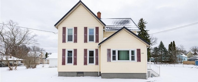 view of snow covered property