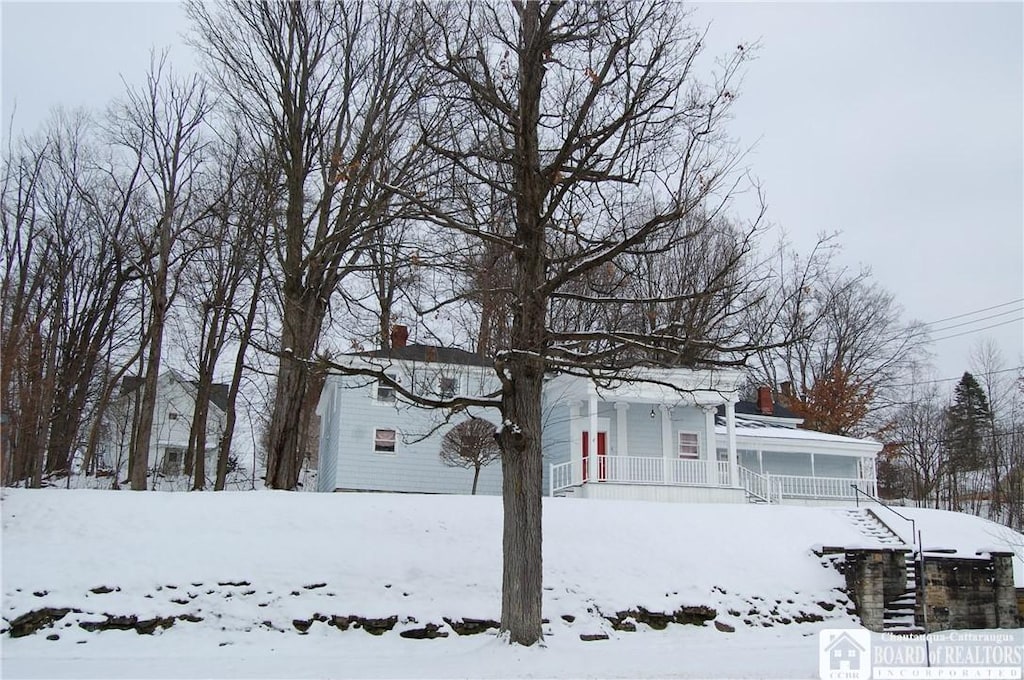 exterior space featuring covered porch