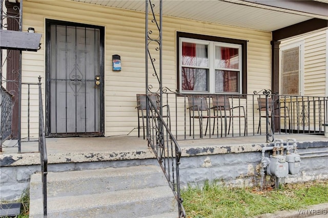 doorway to property with covered porch