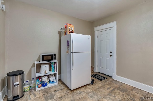 kitchen featuring white refrigerator