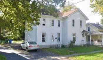 view of front of home with a front lawn