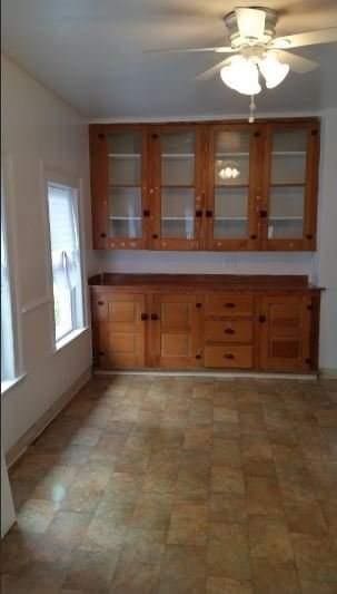 kitchen featuring ceiling fan