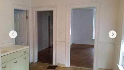 bathroom with hardwood / wood-style floors