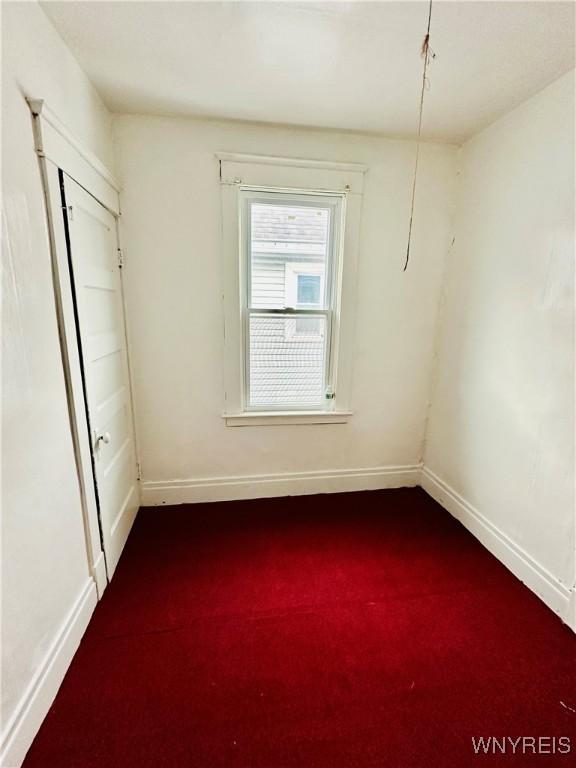 empty room with carpet floors