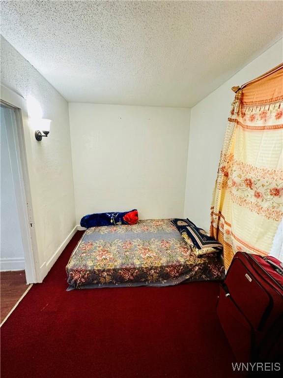 bedroom with a textured ceiling