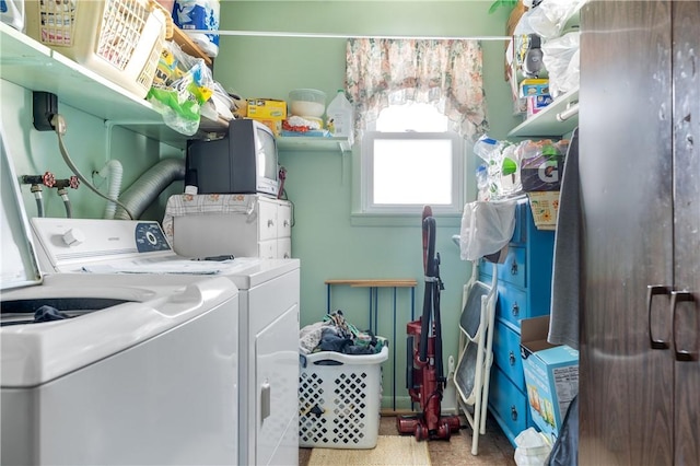 washroom featuring washing machine and dryer