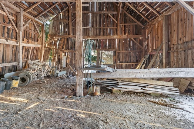 misc room with a wealth of natural light and vaulted ceiling