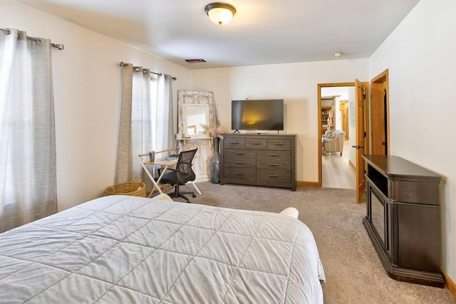 bedroom with light carpet