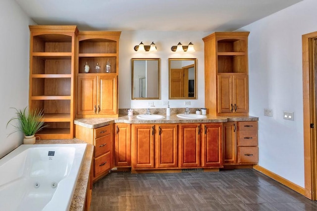 bathroom with vanity and a bathtub