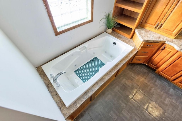 bathroom featuring a bath