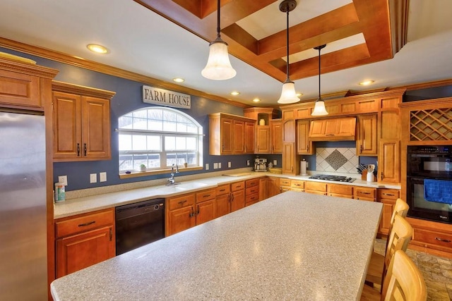 kitchen featuring pendant lighting, sink, crown molding, a breakfast bar area, and black appliances