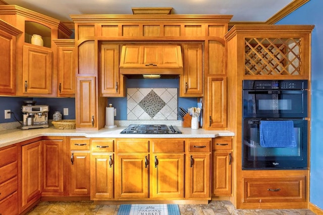 kitchen with crown molding, custom exhaust hood, decorative backsplash, and black appliances