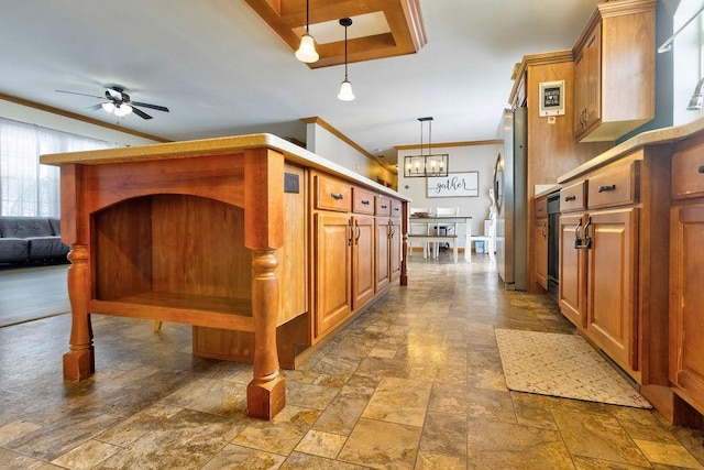 kitchen with crown molding, ceiling fan, stainless steel fridge, and decorative light fixtures