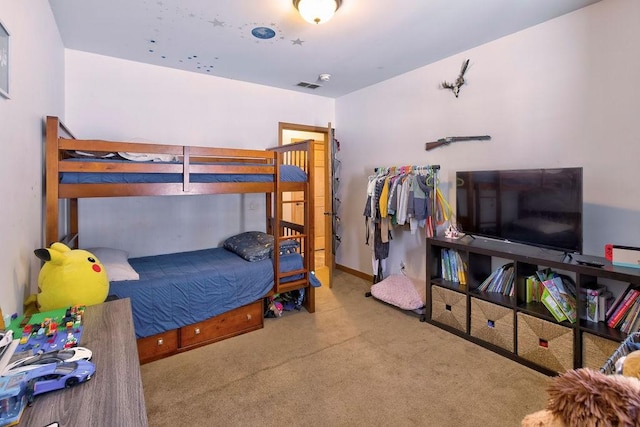 bedroom with light colored carpet