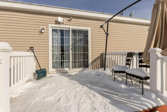 view of snow covered patio