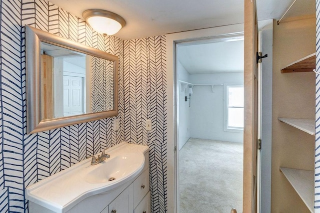 bathroom featuring tile walls and vanity