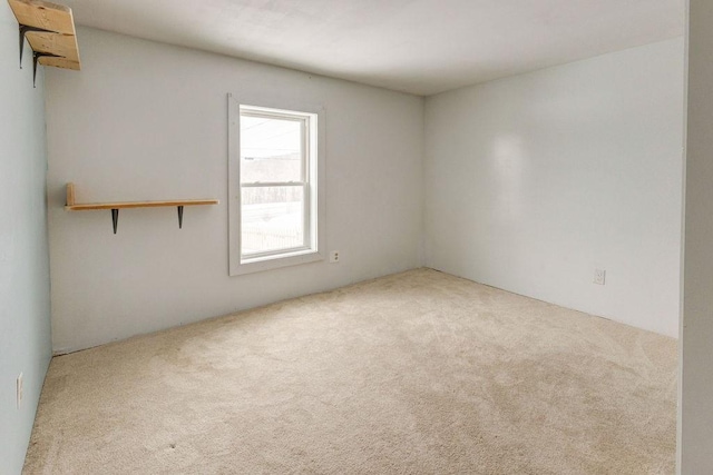 spare room featuring carpet flooring