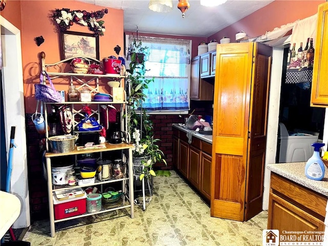 kitchen featuring washer / dryer