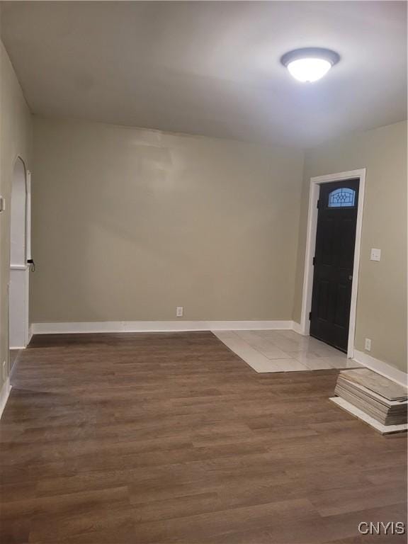 foyer featuring dark wood-type flooring