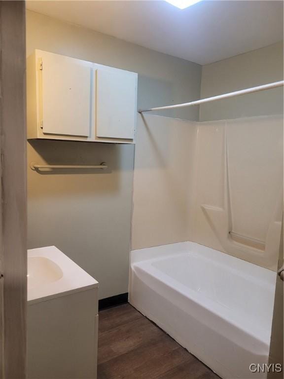 bathroom with hardwood / wood-style flooring and vanity