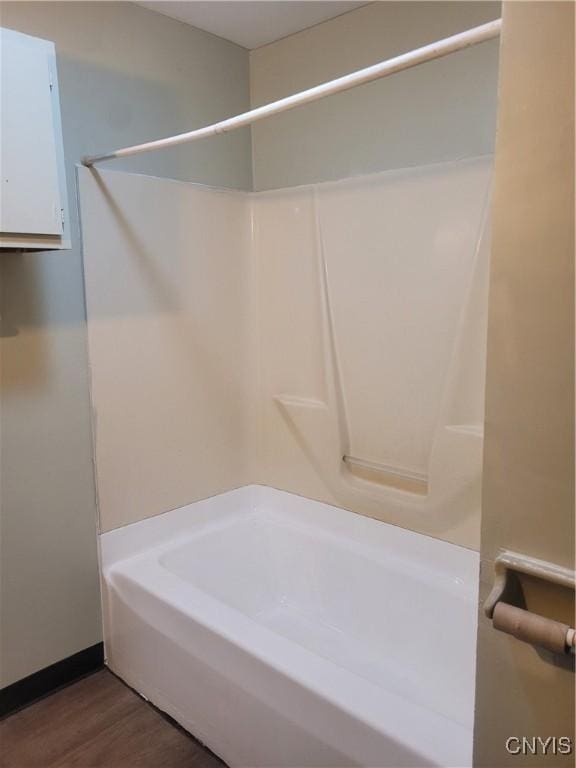 bathroom with wood-type flooring