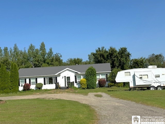 view of front of property with a front lawn