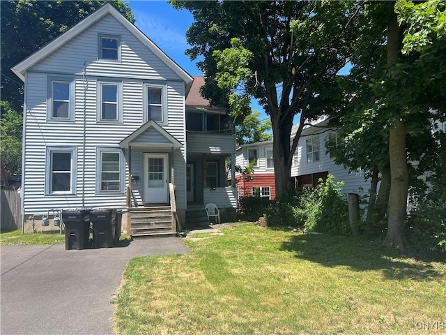 view of front of home with a front lawn