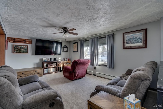 living room with ceiling fan, carpet floors, a baseboard radiator, and a textured ceiling