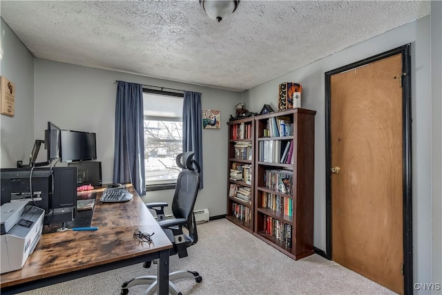 home office with light colored carpet, a textured ceiling, and a baseboard heating unit