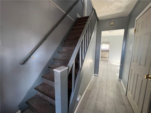 stairway featuring hardwood / wood-style floors