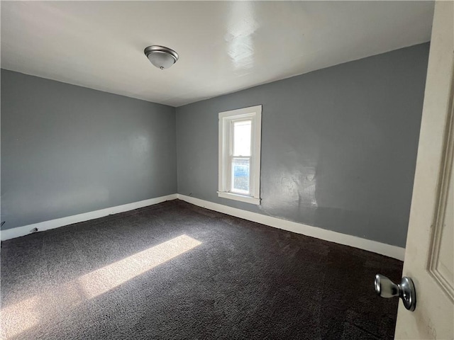 unfurnished room with carpet