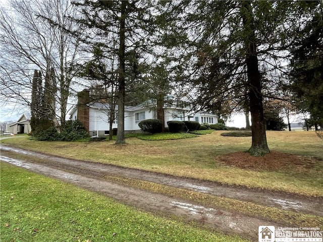 exterior space with a front yard