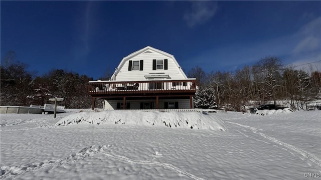 view of front of property featuring a wooden deck