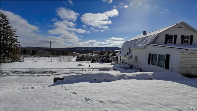 view of snowy yard