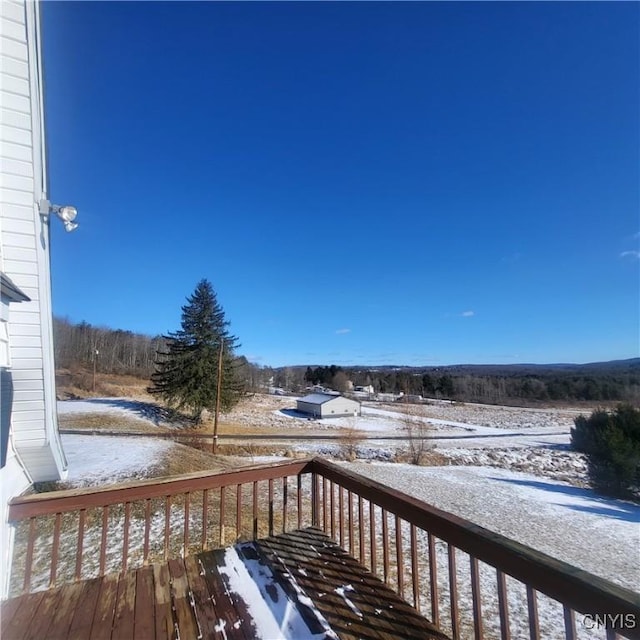 view of snow covered deck