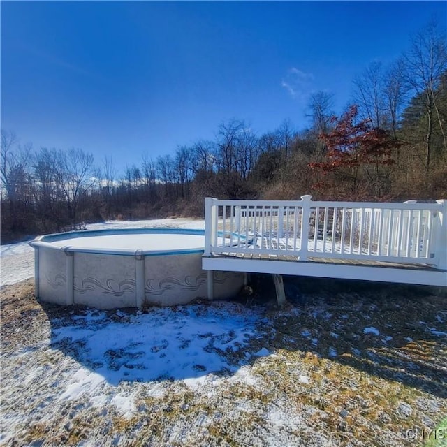 pool featuring a wooden deck