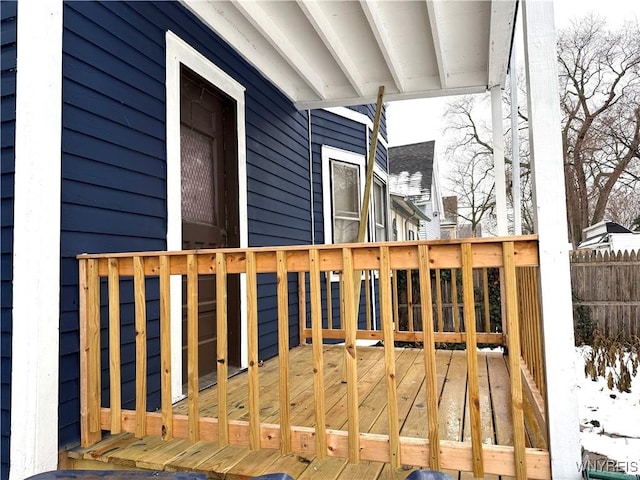 view of snow covered deck