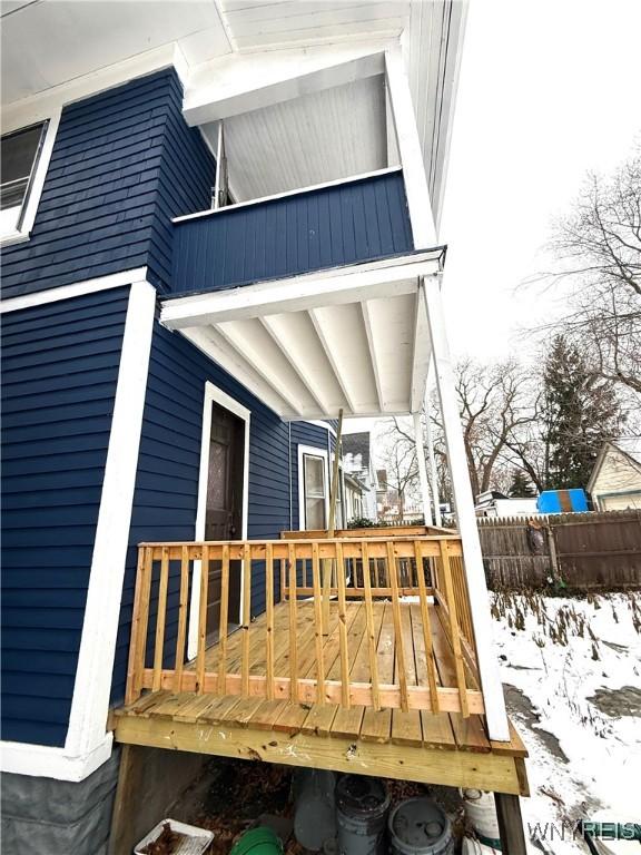 view of snow covered deck