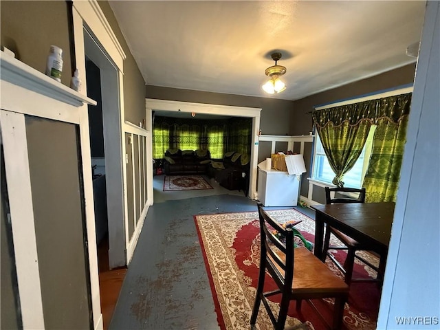 living area featuring concrete flooring