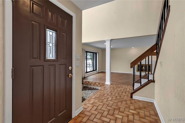 entryway featuring ornate columns