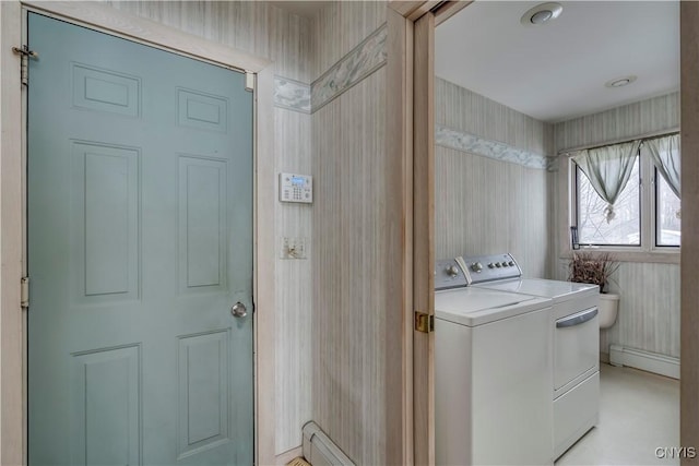 laundry room featuring independent washer and dryer and baseboard heating