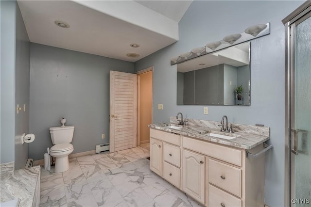 bathroom with vanity, a baseboard radiator, and toilet