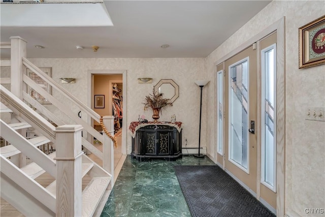 foyer with a baseboard radiator