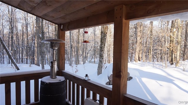 view of snow covered deck