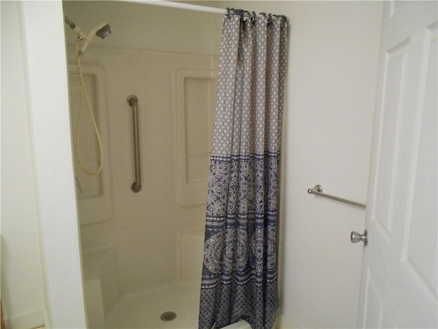 bathroom featuring walk in shower